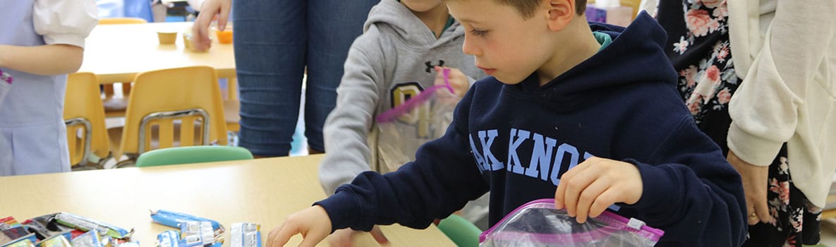 Lower School student serving the community