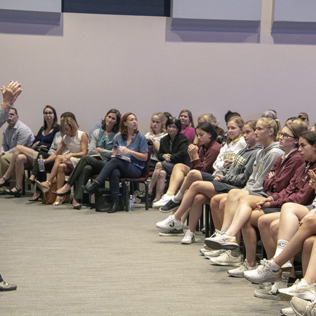 Sharon Wood speaking in front of students at Oak Knoll