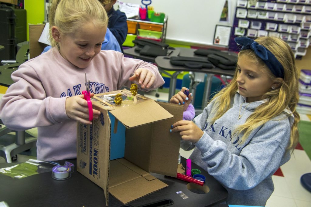 Tuesday, October 18 was Maker Day around the globe and students in the Oak Knoll Lower School were up for the challenge. They enthusiastically entered the IDEAS Lab — one of two well-equipped maker spaces on the Oak Knoll campus — in sessions throughout the day to tackle challenges released by the Global Maker Day website, as well as a few challenges cooked up by Associate Director of Technology, Integration, and Innovation Kimberly Connolly.